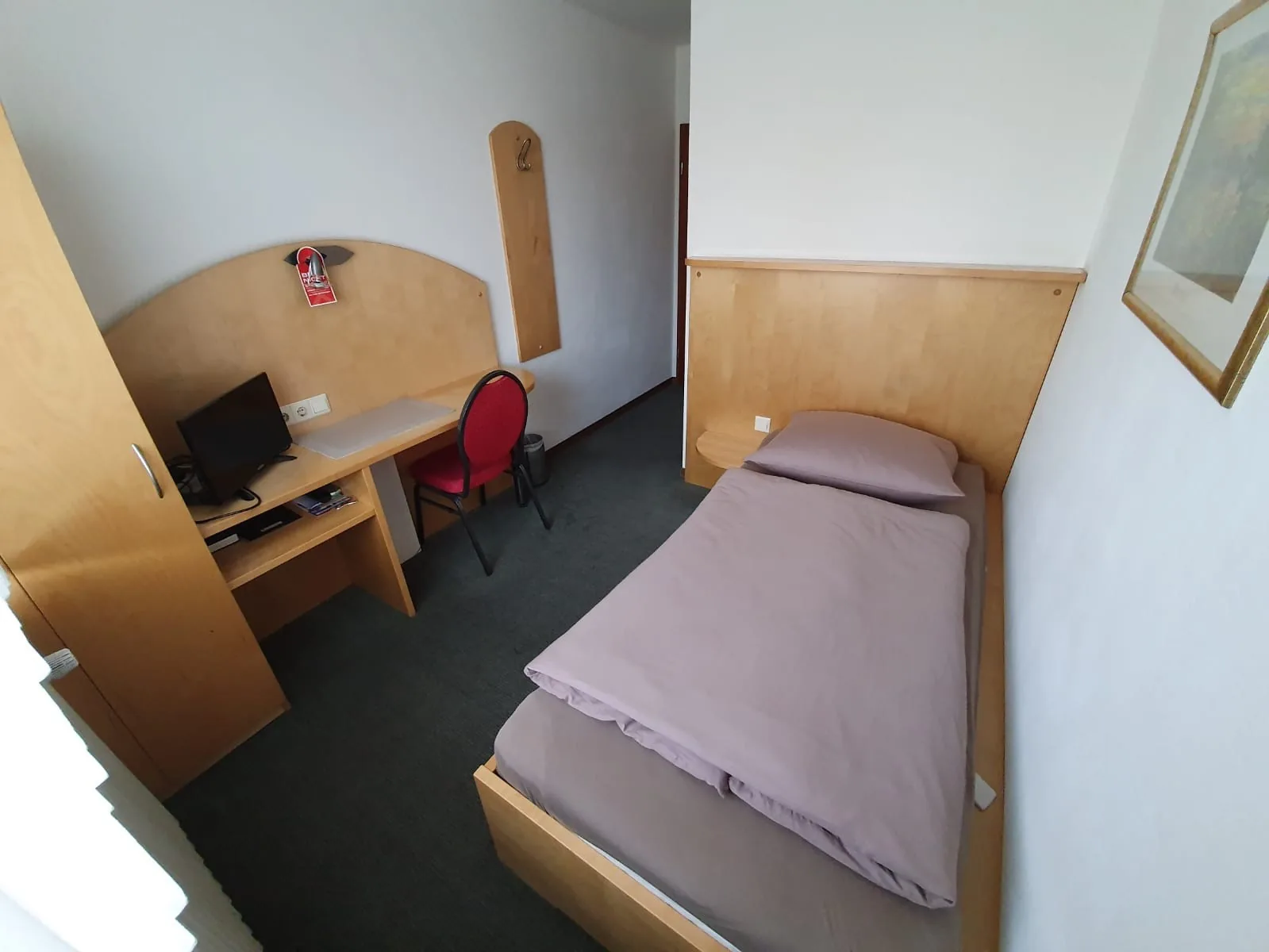 Gepflegtes Einzelzimmer im Parkhotel Alex zum Erholen nach der Schicht